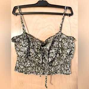 Olive green crop top with white flower detail